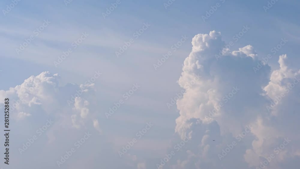 Blue sky white clouds background timelapse. Abstract fluffy, puffy cloudscape in air time lapse. High sunny cumulus. Beautiful weather at cloudy heaven. Beauty of bright color, light in summer nature. Blue sky white clouds background timelapse. Abstract fluffy, puffy cloudscape in air time lapse. High sunny cumulus. Beautiful weather at cloudy heaven. Beauty of bright color, light in summer nature.