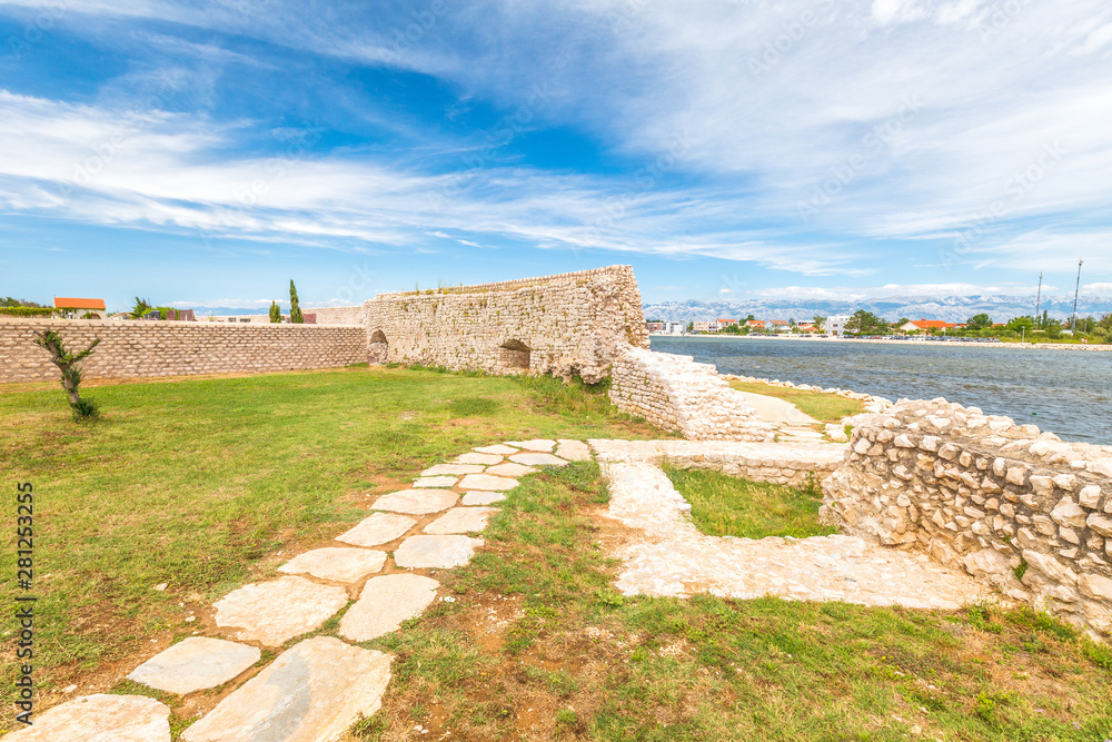 City walls of Nin town in the Zadar County of Croatia, Europe.