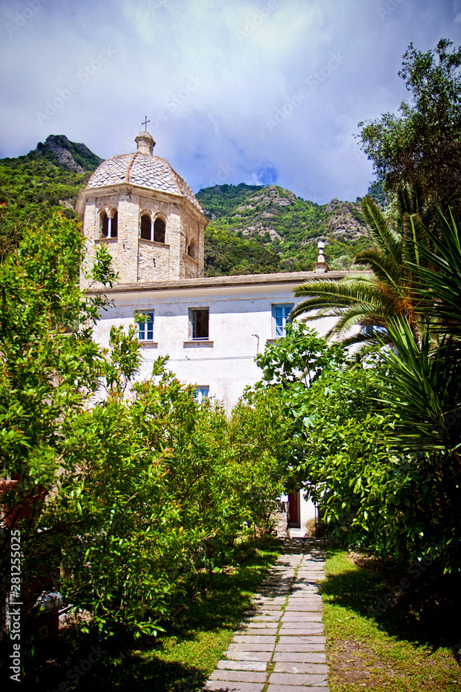 Naklejka premium SAN FRUTTUOSO, ITALY - The old abbey from 10th century, view from the quiet garden