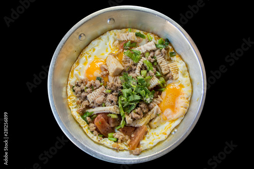 Indochina pan-fried egg with toppings in my homemade Thai style Isolated On back Background