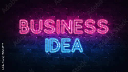 business idea neon sign. purple and blue glow. neon text. Brick wall lit by neon lamps. Night lighting on the wall. 3d illustration. Trendy Design. light banner, bright advertisement