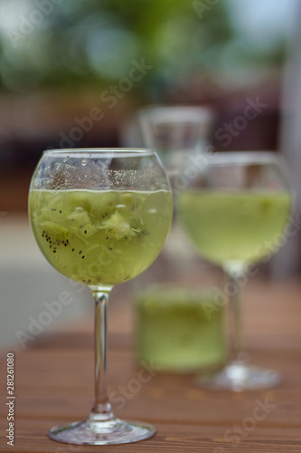Glass with green summer cocktail