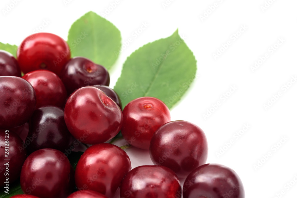 Ripe cherry berries on a white background, close-up Ripe cherry berries on a white background, close-up