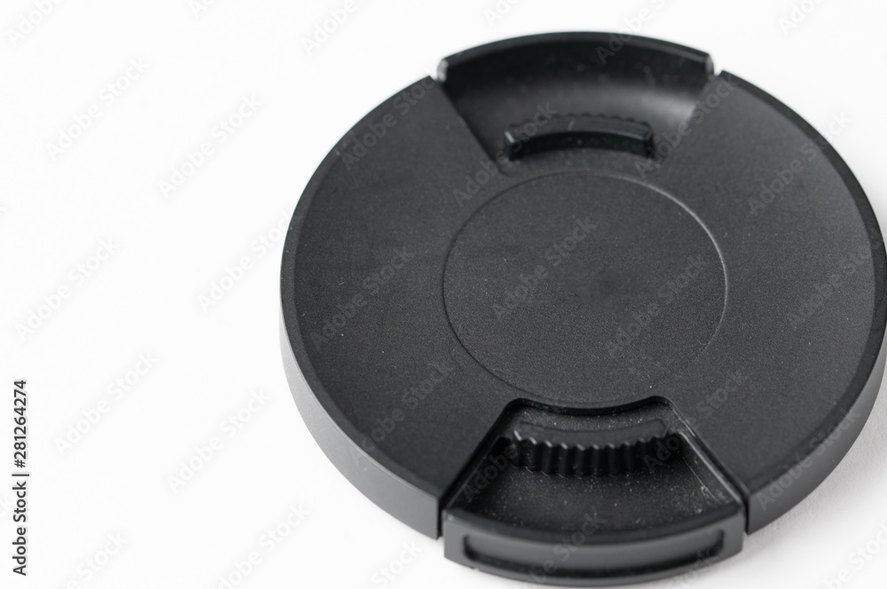 Black cover for camera lens isolated on white background, copy space Black cover for camera lens isolated on white background, copy space