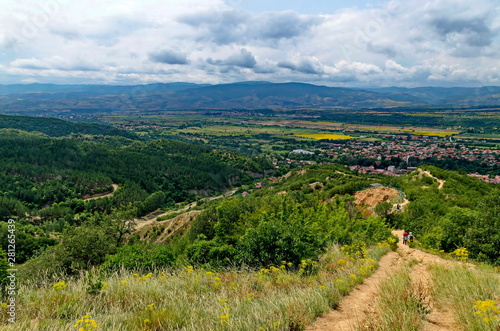 A view from path on the slope of the Stob Pyramids to the valley of the village of Stob, Rila mountain, Kyustendil region, Bulgaria, Europe    