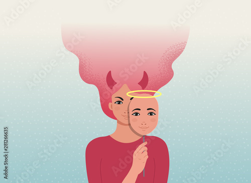 Evil devil woman is covering her face with a good angel mask.  
