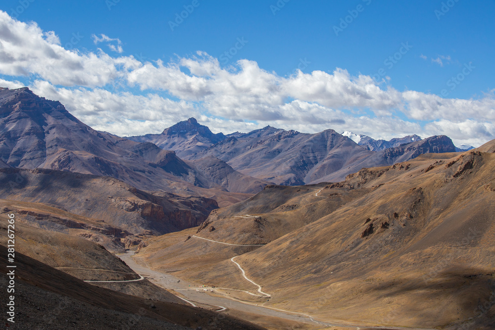 Himalayan mountain landscape along Leh to Manali highway. Winding road and rocky mountains in Indian Himalayas, India