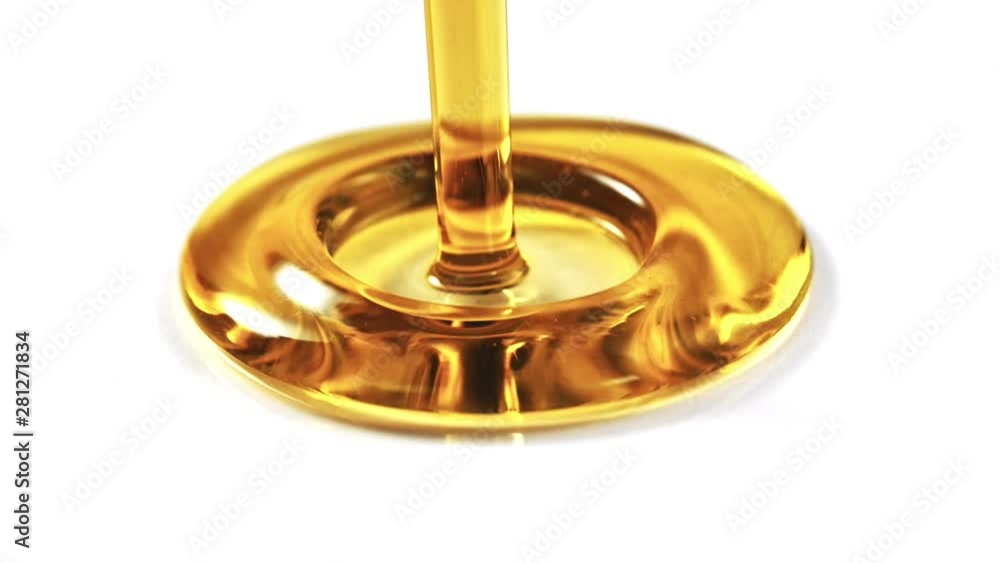 Super slow motion shot of pouring oil on white background. Shooted with high speed cinema camera at 1000fps. Super slow motion shot of pouring oil on white background. Shooted with high speed cinema camera at 1000fps.