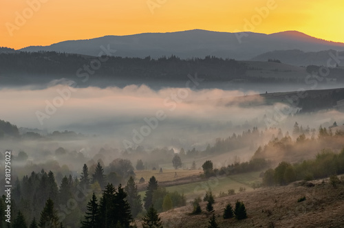 Beautiful autumn landscape at sunrise g in Carpathian mountains, Ukraine