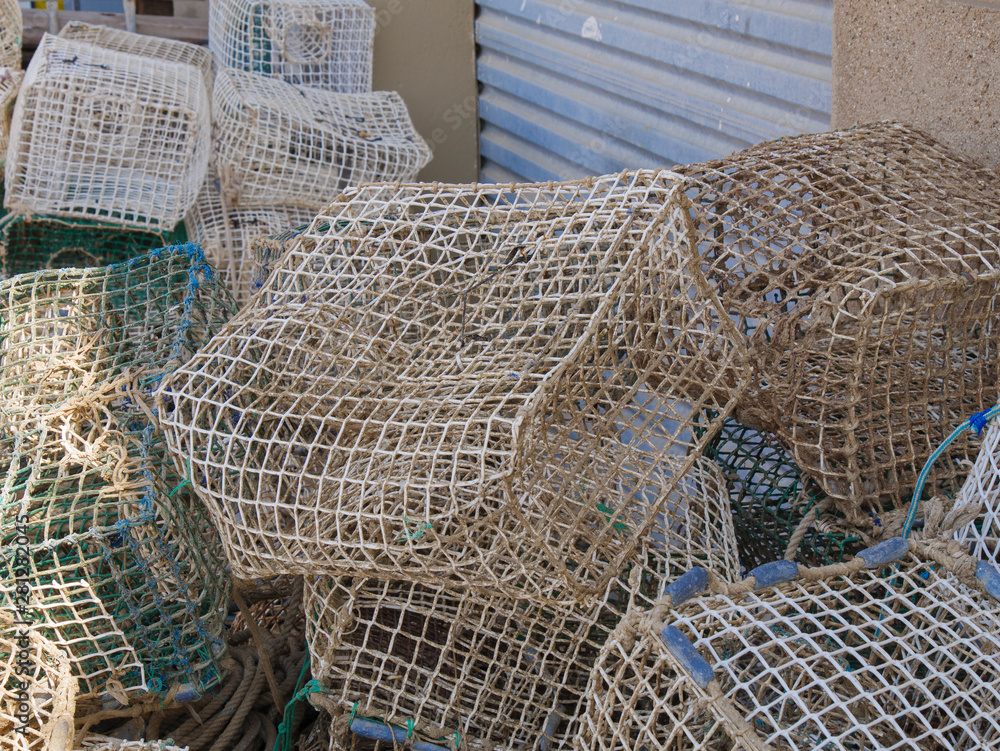 Group of fish and shellfish traps in a port, ready to be carried in a fishing ship