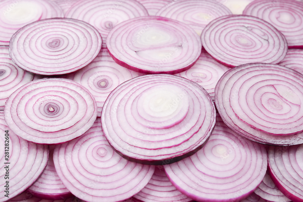 Onion slices as a background. Top view. Onion slices as a background. Top view.