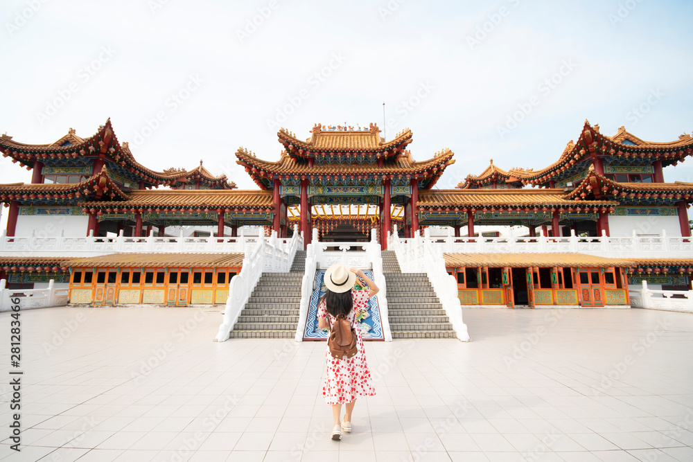 Naklejka premium Woman tourist is sightseeing and traveling inside Thean Hou Temple in Kuala Lumpur, Malaysia.