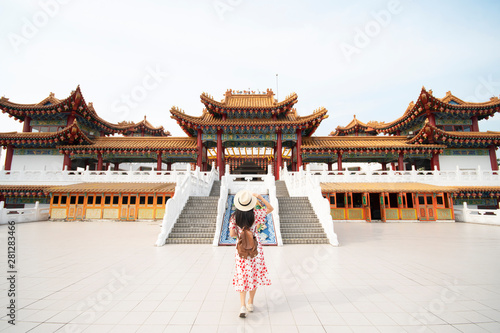 Woman tourist is sightseeing and traveling inside Thean Hou Temple in Kuala Lumpur, Malaysia.