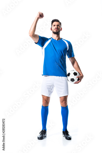 Fototapeta Naklejka Na Ścianę i Meble -  soccer player with ball Gesturing with clenched hand Isolated On White
