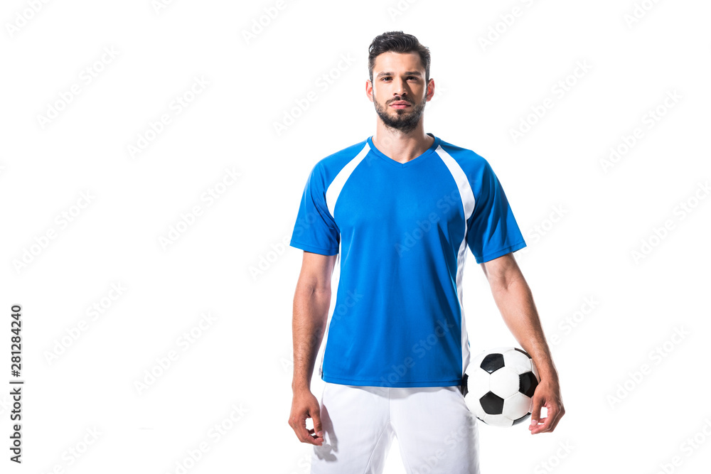 soccer player holding ball and looking at camera Isolated On White