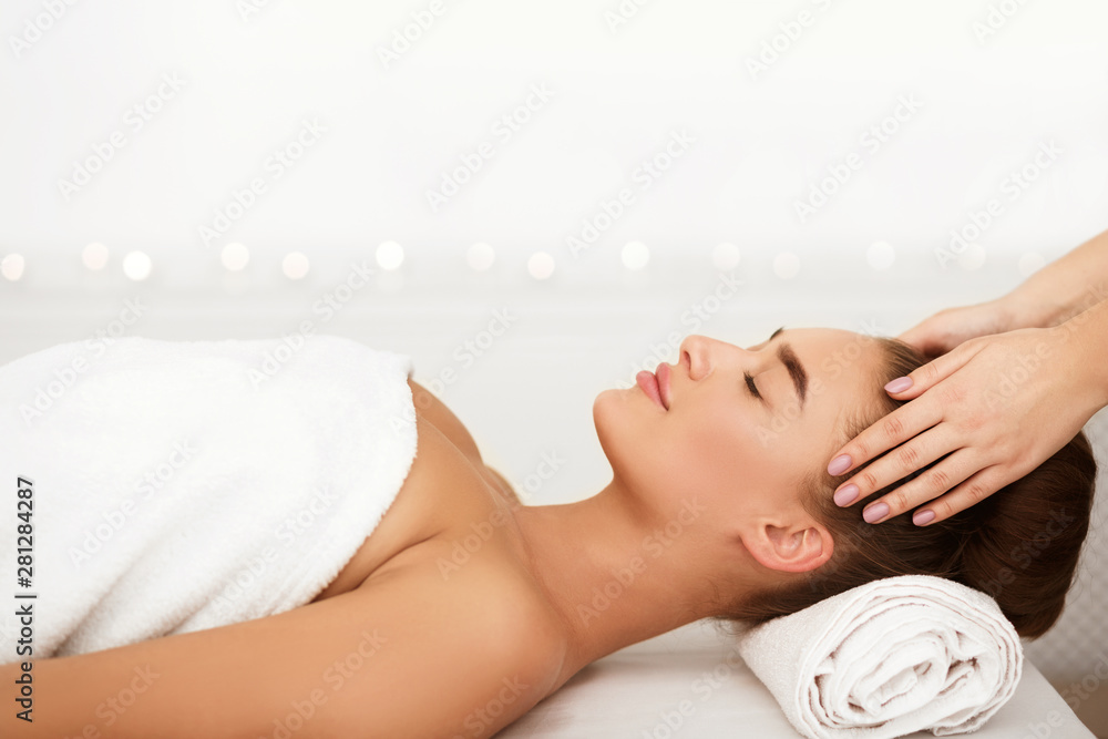 Relaxing massage. Woman receiving professional treatment at spa Relaxing massage. Woman receiving professional treatment at spa