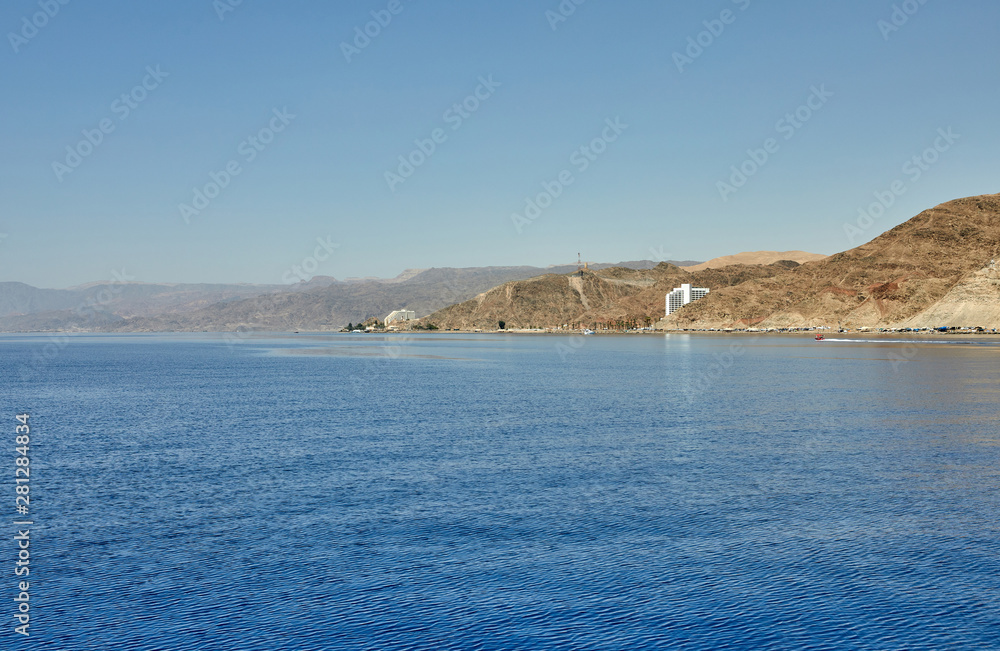 View from the luxury yacht to the Red Sea. Hotels for tourists, boats and yachts for a holiday.