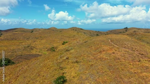 Teletubbies Hill. Drone Shot Tropical Savanna Hills at Nusa Penida, Bali - Indonesia photo