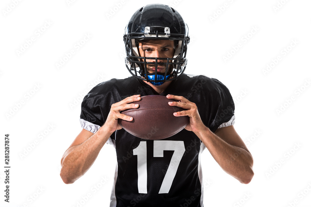 American Football player with ball looking at camera Isolated On White