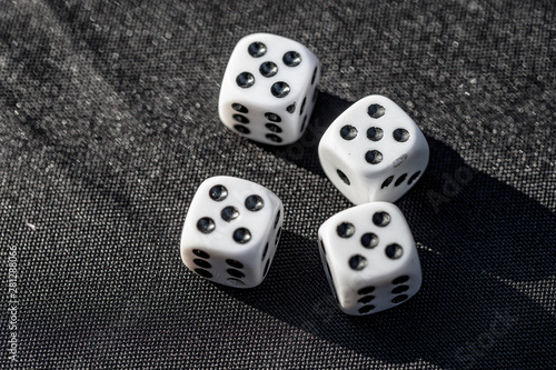 Dice Rolled 4 Fives on Black Table
