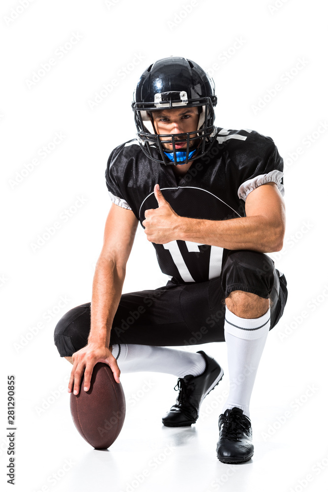 American Football player with ball doing thumb up sign On White