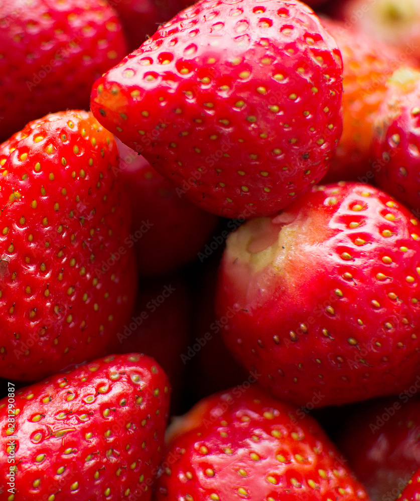 strawberries in a bowl closeup strawberries in a bowl closeup