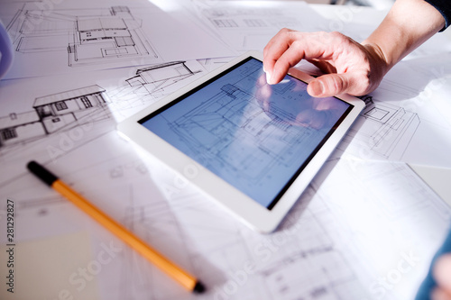 Architect using digital tablet photo