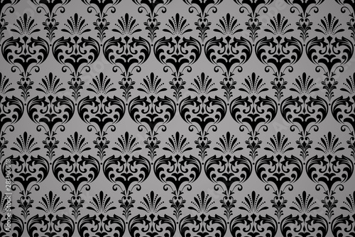Wallpaper in the style of Baroque. Seamless vector background. Black and grey floral ornament. Graphic pattern for fabric, wallpaper, packaging. Ornate Damask flower ornament