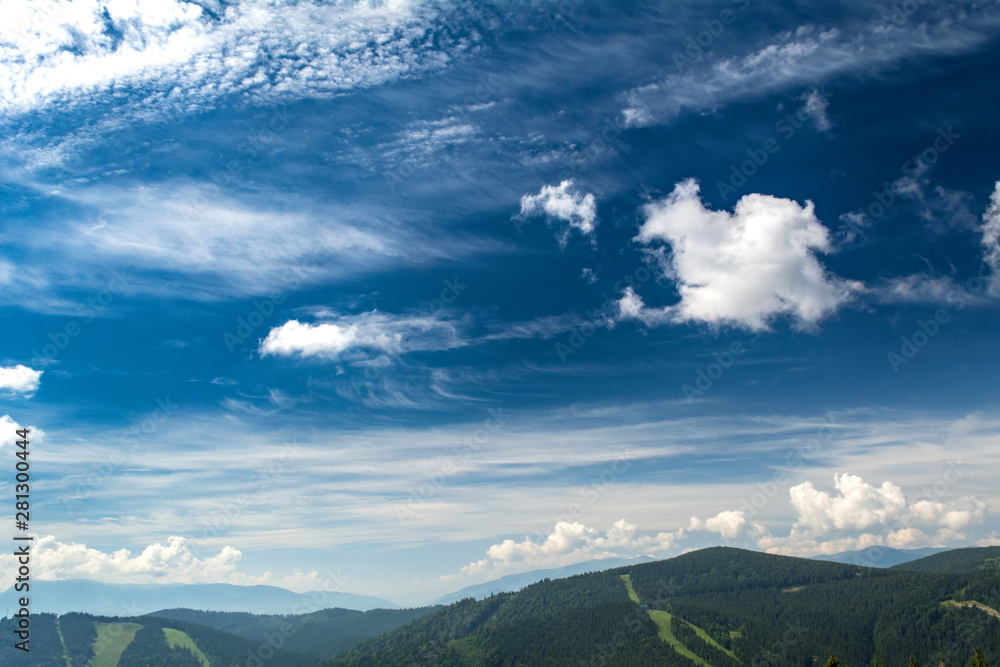 Beautiful clouds over the mountains. Summer landscape. Ukrainian Carpathians