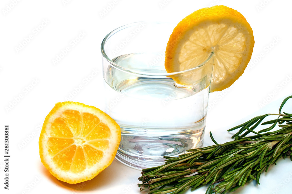 Glass of pure water with lemon isolated on a white background Glass of pure water with lemon isolated on a white background