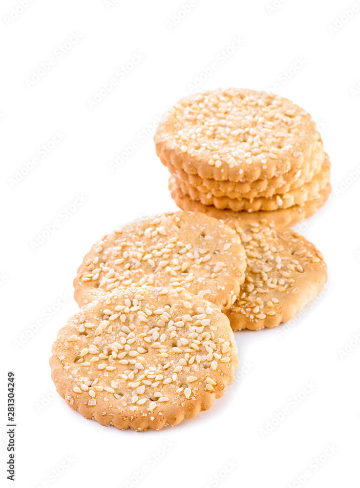 group of cookies with grains of sugar and sesame seeds close-up isolated on white background