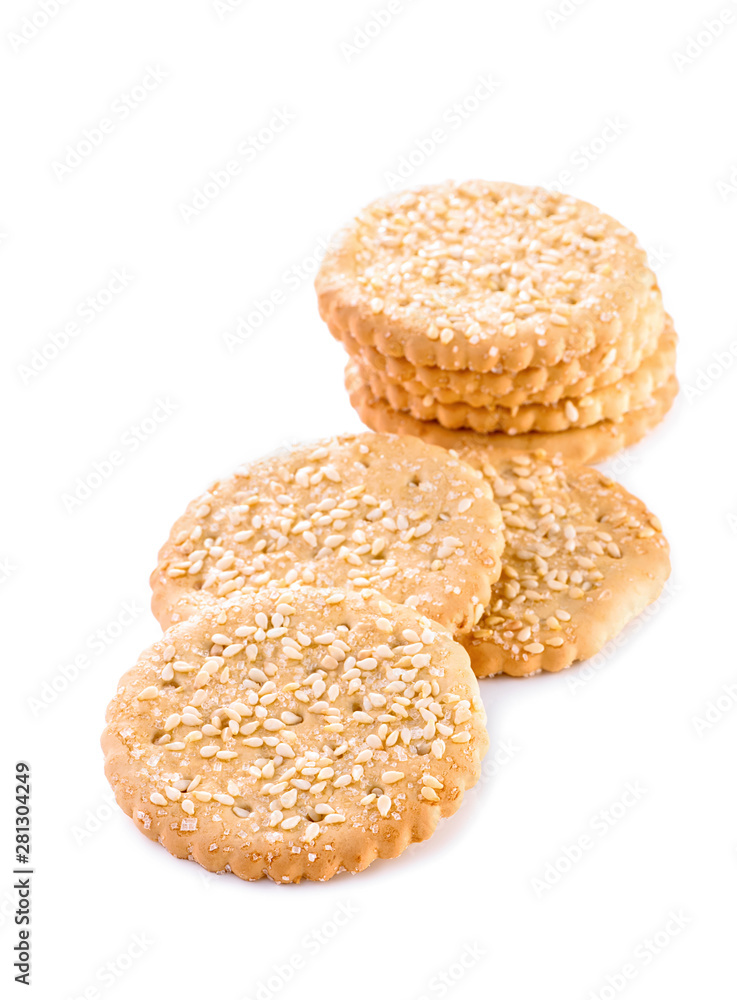 group of cookies with grains of sugar and sesame seeds close-up isolated on white background group of cookies with grains of sugar and sesame seeds close-up isolated on white background