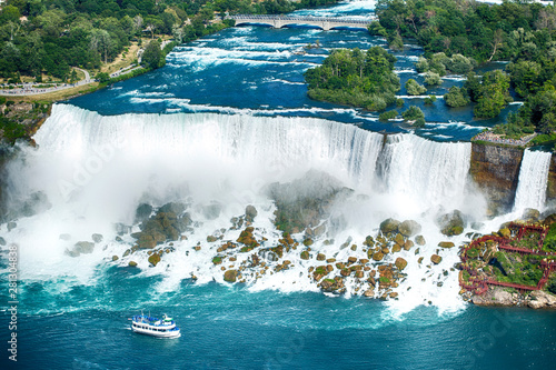 American Falls and Bridal Veil Falls, Niagara Falls, New York, America, USA. Niagara Falls boat tours attraction.