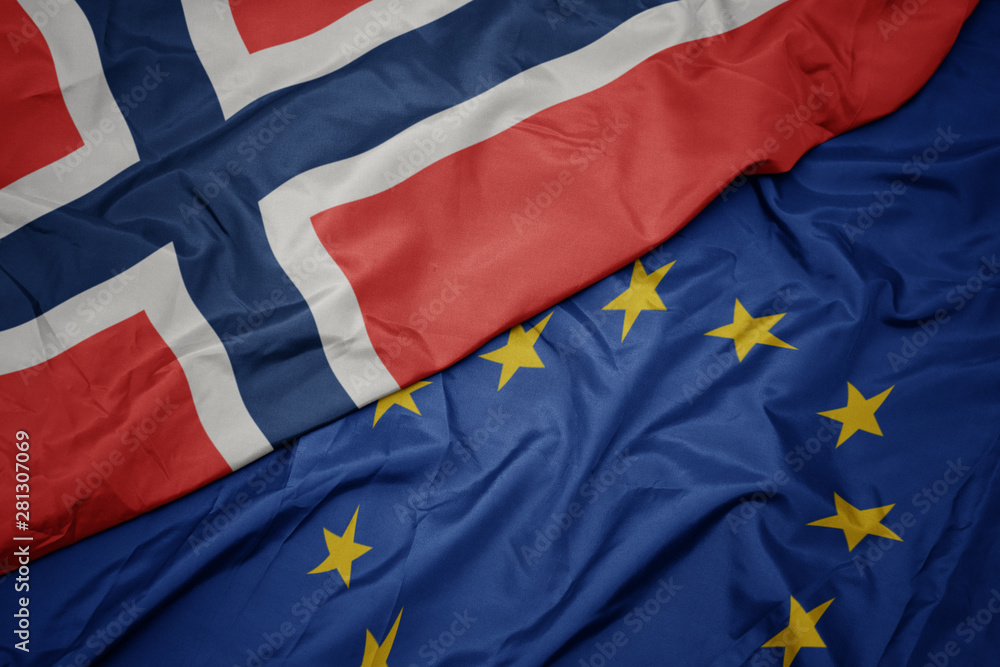 waving colorful flag of european union and national flag of norway. waving colorful flag of european union and national flag of norway.