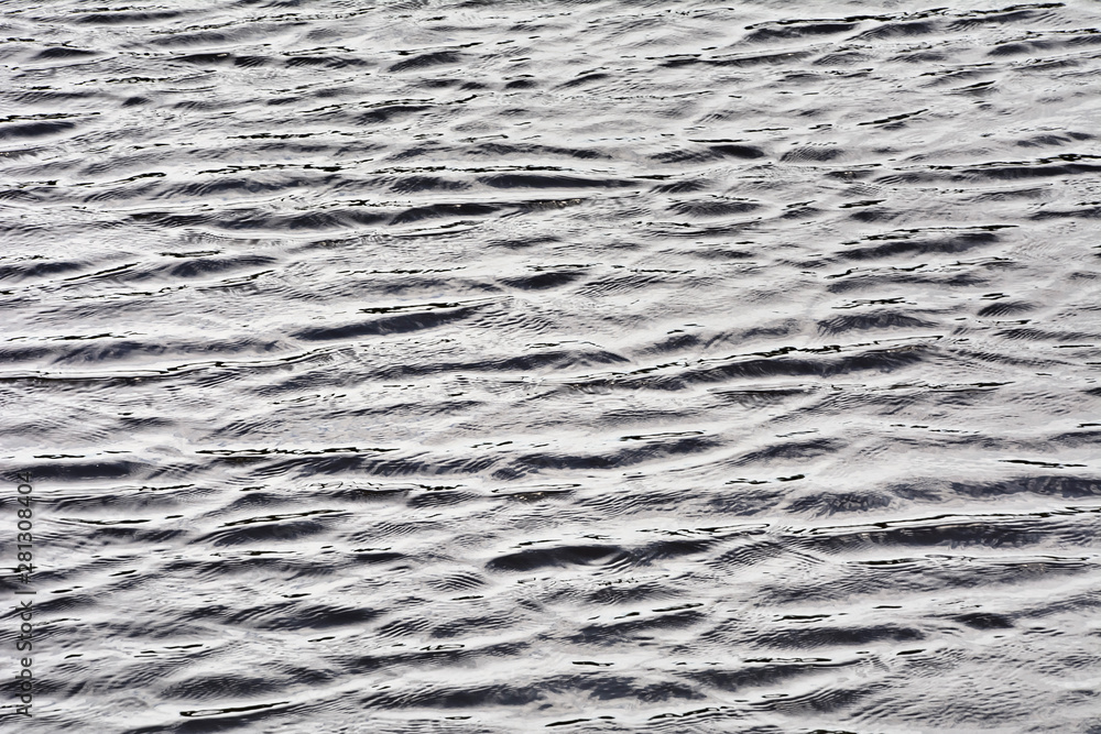The surface of water with small vaves The surface of water with small vaves