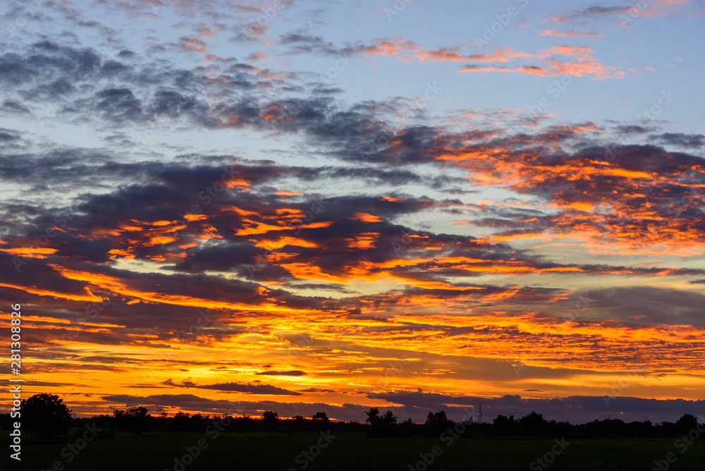 Fototapeta premium red cloud disappear in the hot sunset time / red cloud disappear in sunset time