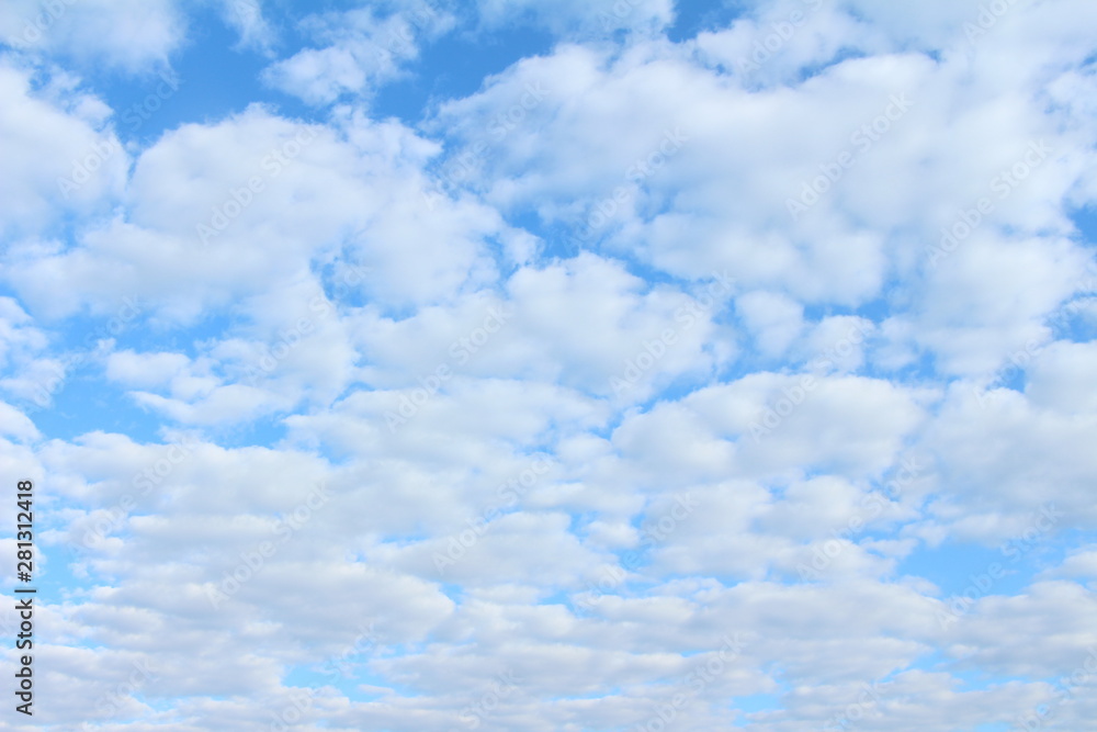 many cumulus clouds in the blue sky many cumulus clouds in the blue sky