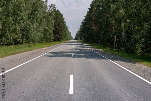 flat asphalt road for cars with markings