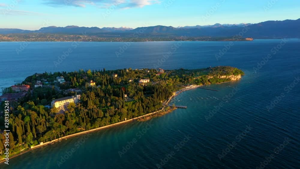 Flight by a drone, aerial view of Rocca Scaliger Castle in Sirmione. Lake Garda. Italy. Flight by a drone, aerial view of Rocca Scaliger Castle in Sirmione. Lake Garda. Italy.