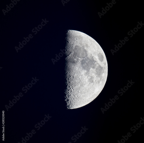 The half moon and its craters. photo