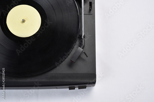 old vinyl record player on white background