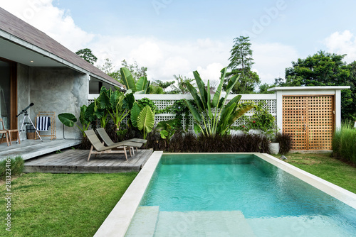 Backyard with swimming pool in luxury villa, Bali photo