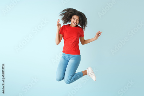 Jumping African-American wo...