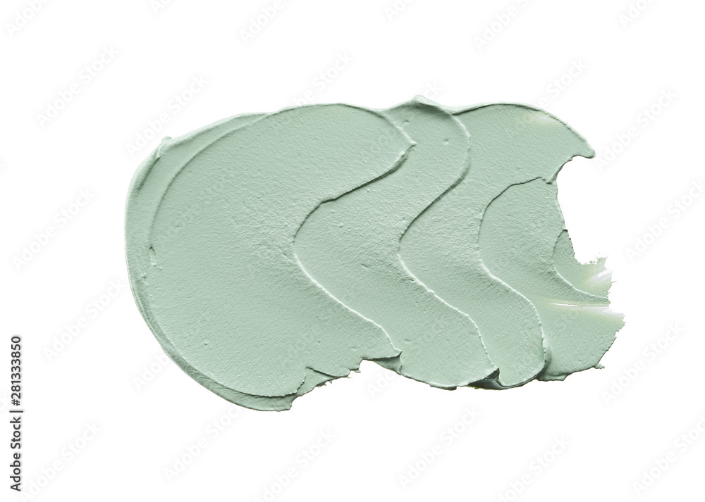 Gently green strokes and texture of face cream or acrylic paint isolated on white background Gently green strokes and texture of face cream or acrylic paint isolated on white background