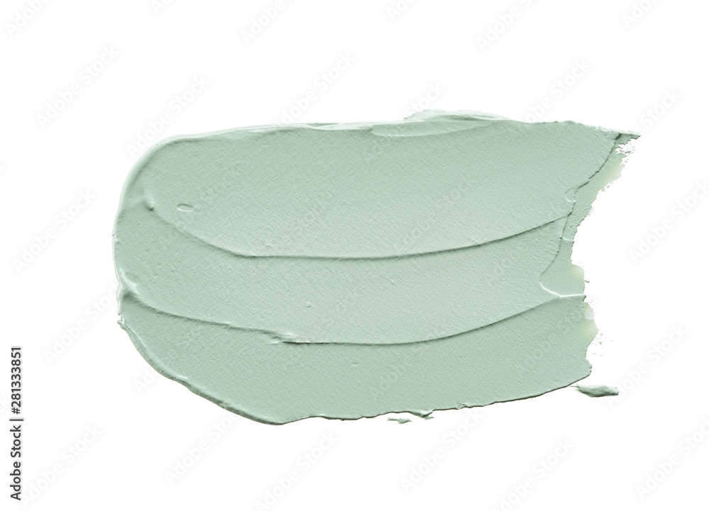 Gently green strokes and texture of face cream or acrylic paint isolated on white background Gently green strokes and texture of face cream or acrylic paint isolated on white background