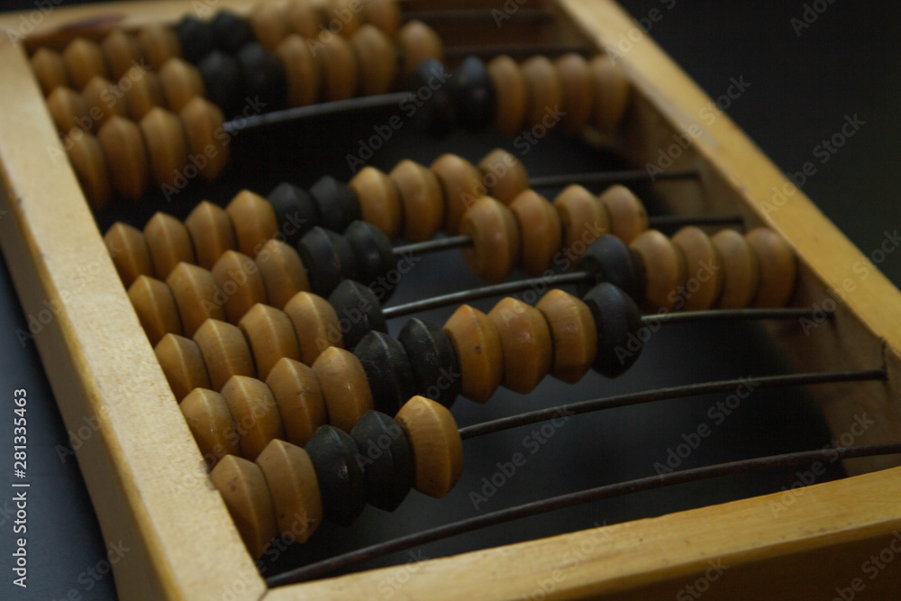 quadrangle frame abacus, item from wood, black background quadrangle frame abacus, item from wood, black background