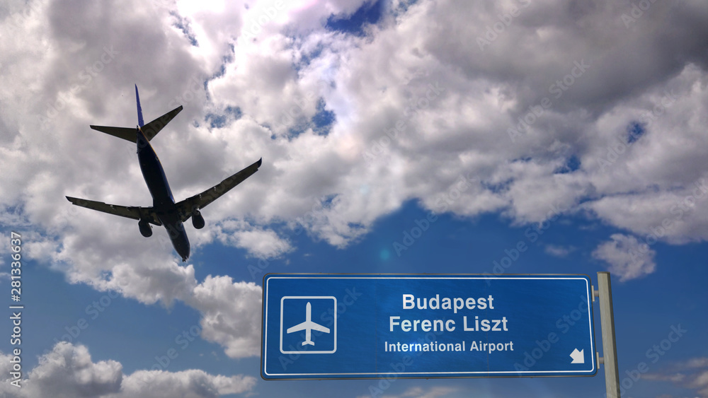 Fototapeta premium Plane landing in Budapest Ferenc Liszt with signboard