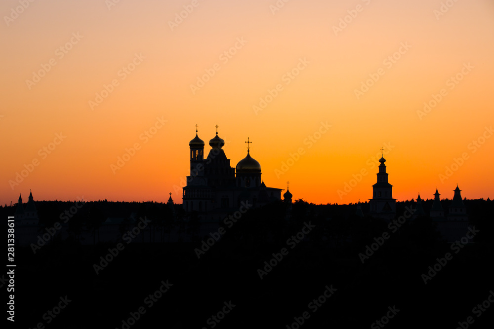 Silhouette of an orthodox temple at sunset