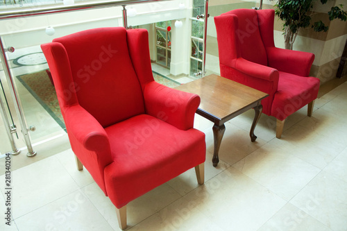 Red armchair in the hall
