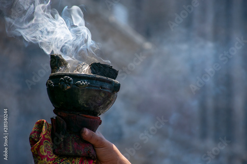 Copal, humo aromático de tradición durante rituales de danza azteca. Sahumerio photo